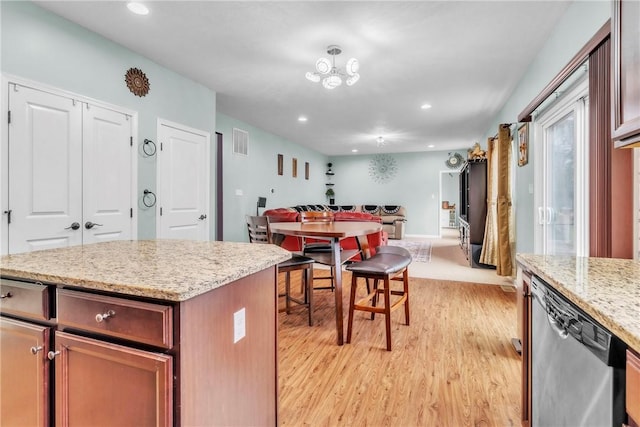 2972 Cross Creek Ct, Hampton, PA 15044 - kitchen featuring stainless steel dishwasher, light wood-type flooring, recessed lighting, light stone counters, and open floor plan