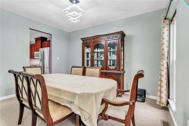 2972 Cross Creek Ct, Hampton, PA 15044 - dining space featuring light colored carpet and baseboards