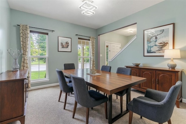 2972 Cross Creek Ct, Hampton, PA 15044 - dining room featuring light carpet and plenty of natural light