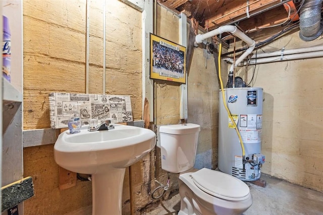 2519 Sylvania Dr, Bethel Park, PA 15102 - bathroom featuring gas water heater and unfinished concrete flooring