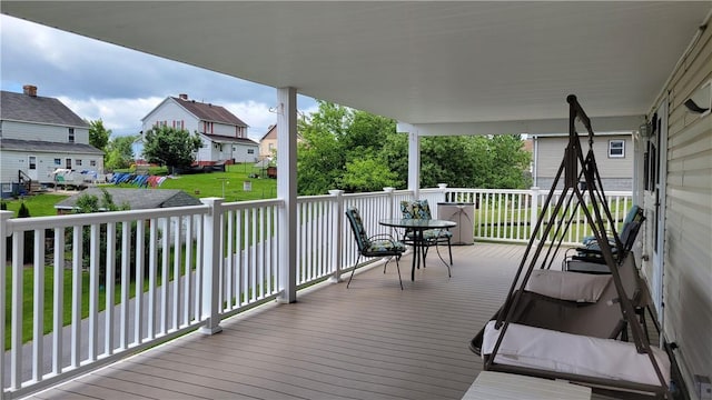 287 School Ave, Conemaugh Twp Som, PA 15937 - deck with outdoor dining area, a residential view, and a yard