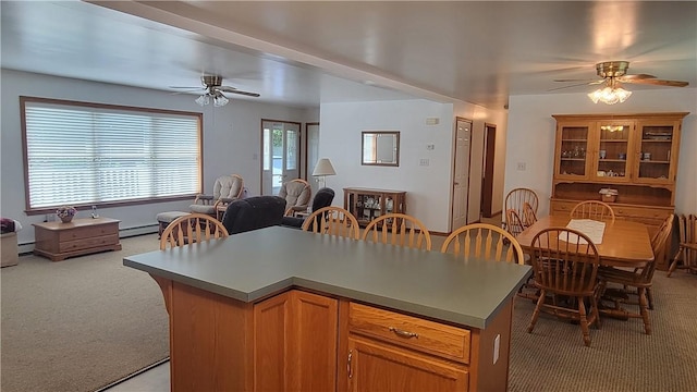 287 School Ave, Conemaugh Twp Som, PA 15937 - kitchen with light colored carpet, a ceiling fan, a baseboard radiator, and open floor plan