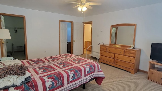 287 School Ave, Conemaugh Twp Som, PA 15937 - bedroom with light colored carpet, a ceiling fan, and a spacious closet