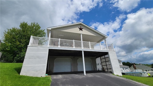 287 School Ave, Conemaugh Twp Som, PA 15937 - view of front of home featuring driveway, a garage, and a front yard