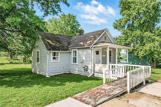 209 George St, Farrell, PA 16121 - view of front of property featuring a front yard, a chimney, a porch, and roof with shingles