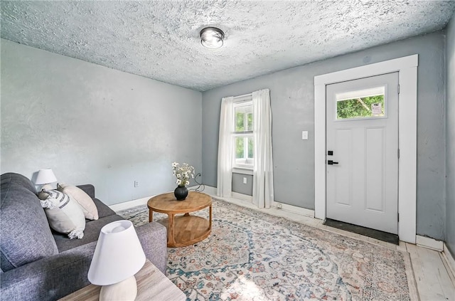 209 George St, Farrell, PA 16121 - foyer featuring plenty of natural light and a textured ceiling