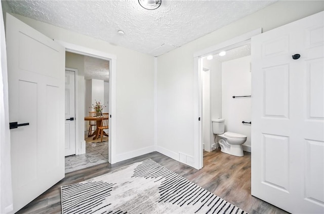 209 George St, Farrell, PA 16121 - bathroom with a textured ceiling and wood finished floors