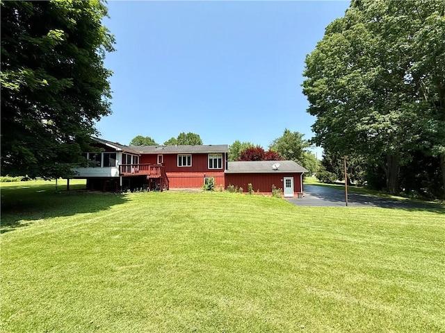 155 Anoka, Neshannock Twp, PA 16105 - rear view of house featuring a deck, a yard, and asphalt driveway