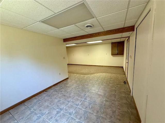 155 Anoka, Neshannock Twp, PA 16105 - finished below grade area with a paneled ceiling, carpet, and tile patterned flooring