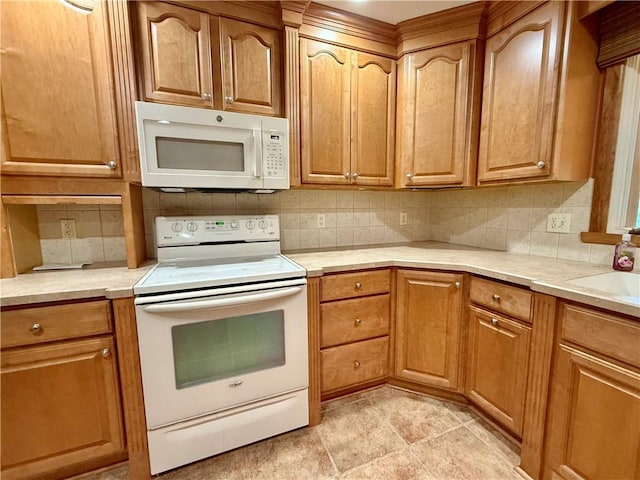 155 Anoka, Neshannock Twp, PA 16105 - kitchen with white appliances, tasteful backsplash, light countertops, and brown cabinetry