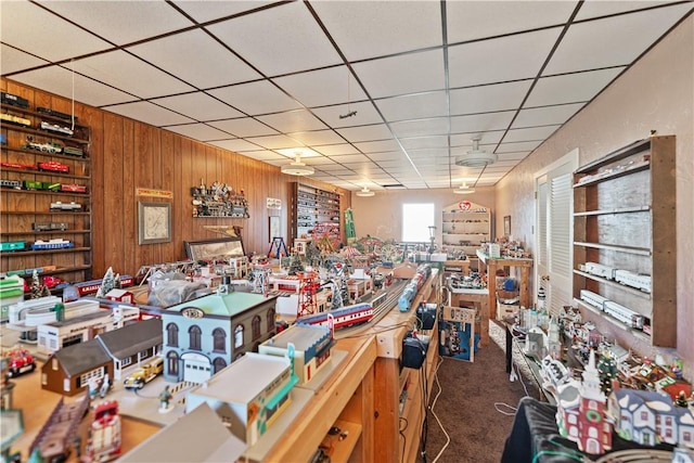 2403 Jenny Lind St, Mckeesport, PA 15132 - misc room with wood walls, carpet flooring, and a drop ceiling