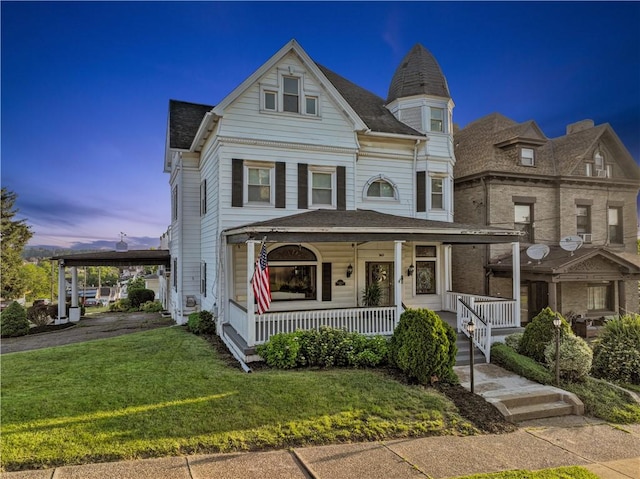 2403 Jenny Lind St, Mckeesport, PA 15132 - victorian-style house featuring covered porch, a front lawn, and a shingled roof