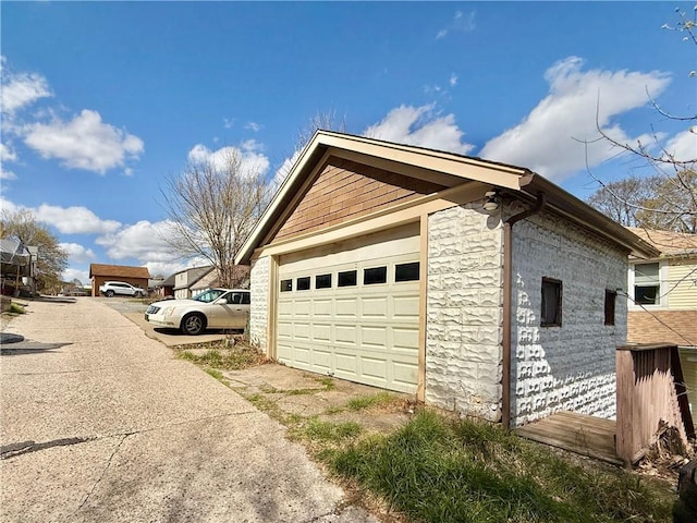 1235 Arkansas Ave, Dormont, PA 15216 - view of property exterior with a garage and driveway