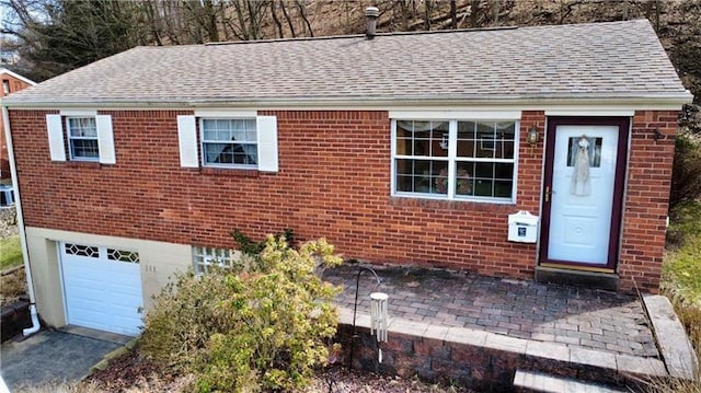 111 Greenview Dr, Verona, PA 15147 - single story home featuring brick siding, roof with shingles, and a garage