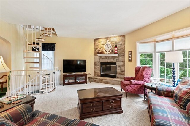 517 Keystone Dr, New Kensington, PA 15068 - living area featuring carpet floors, a fireplace, and stairs