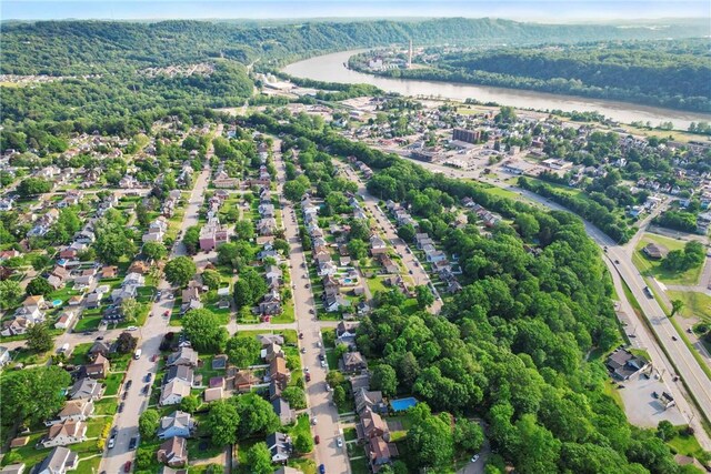 517 Keystone Dr, New Kensington, PA 15068 - aerial view of property's location featuring a nearby body of water and a heavily wooded area