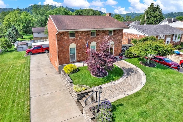 2684 3rd St, Monroeville, PA 15146 - view of front of home featuring brick siding, a chimney, driveway, and a shingled roof