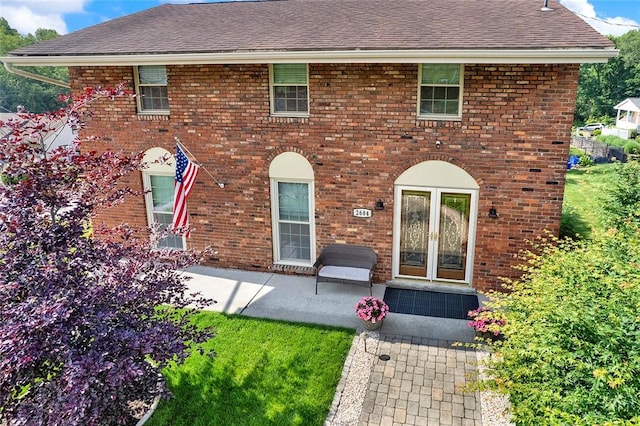 2684 3rd St, Monroeville, PA 15146 - view of front of home with brick siding, a patio area, and roof with shingles