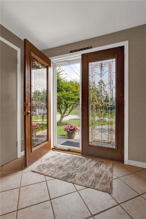2684 3rd St, Monroeville, PA 15146 - doorway to outside featuring tile patterned flooring and baseboards