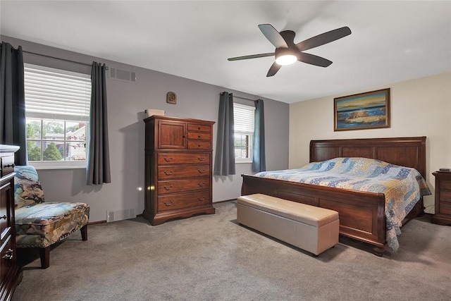 2684 3rd St, Monroeville, PA 15146 - bedroom with light colored carpet, multiple windows, and ceiling fan