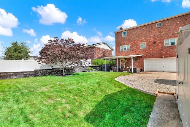 2684 3rd St, Monroeville, PA 15146 - view of yard with an attached garage, driveway, and a patio