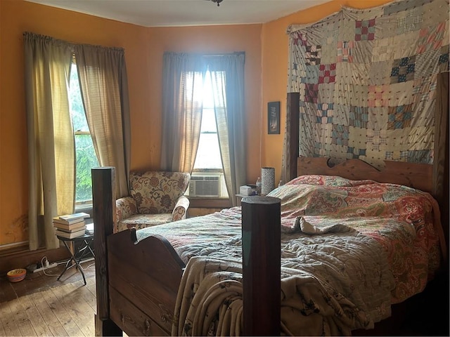 511 Arthur Ave, Scottdale, PA 15683 - bedroom with multiple windows, hardwood / wood-style floors, and cooling unit