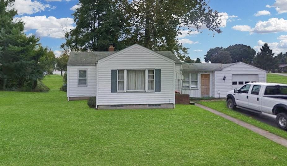 950 9th St, Taylor Twp, PA 16160 - view of front of property with a garage, a front lawn, and driveway