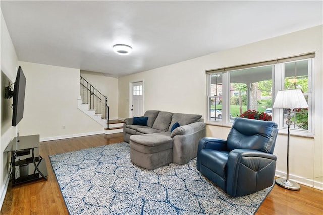 1333 Windermere Dr, Squirrel Hill, PA 15218 - living room featuring stairs and wood finished floors