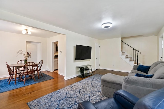 1333 Windermere Dr, Squirrel Hill, PA 15218 - living area with dark wood-type flooring and stairway