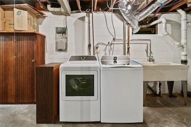 1333 Windermere Dr, Squirrel Hill, PA 15218 - laundry room with washer and clothes dryer and concrete block wall
