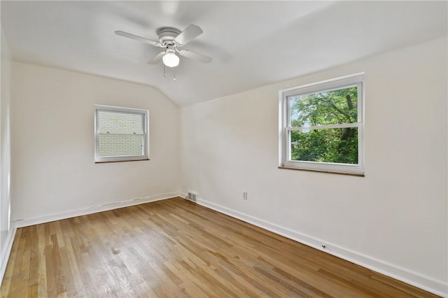 1333 Windermere Dr, Squirrel Hill, PA 15218 - unfurnished room featuring plenty of natural light, lofted ceiling, wood finished floors, and ceiling fan
