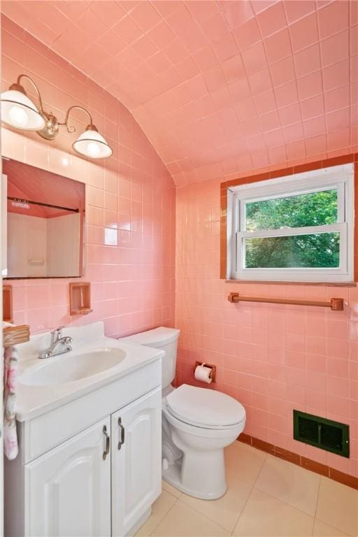 1333 Windermere Dr, Squirrel Hill, PA 15218 - half bathroom with tile walls, tile patterned flooring, and vanity