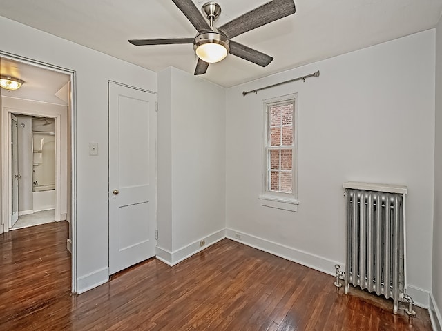 6656 Wilkins Ave, Squirrel Hill, PA 15217 - empty room featuring radiator, wood finished floors, and ceiling fan