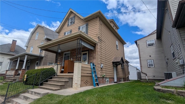 1621 4th St, New Brighton, PA 15066 - view of front of house featuring covered porch and a front yard