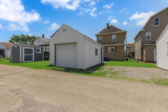 1621 4th St, New Brighton, PA 15066 - detached garage featuring a shed and driveway