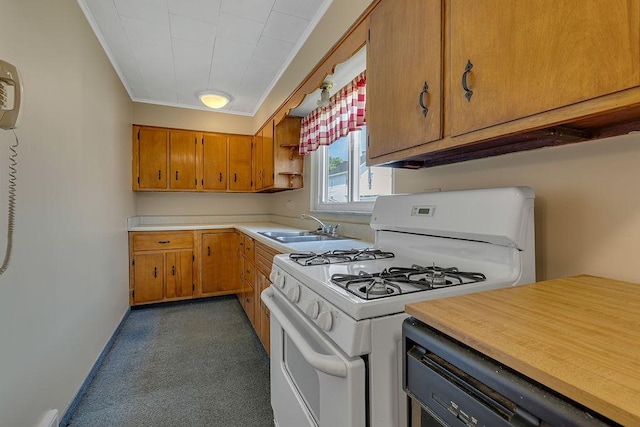 1621 4th St, New Brighton, PA 15066 - kitchen featuring white range with gas cooktop, crown molding, light countertops, brown cabinets, and dark carpet