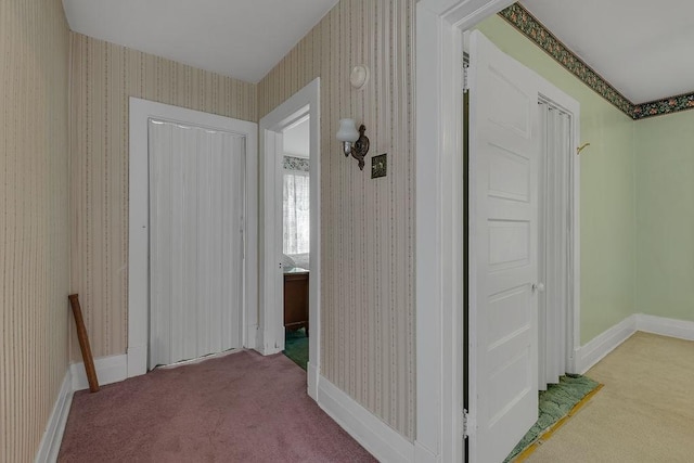 1621 4th St, New Brighton, PA 15066 - hall with carpet flooring, wallpapered walls, and an upstairs landing