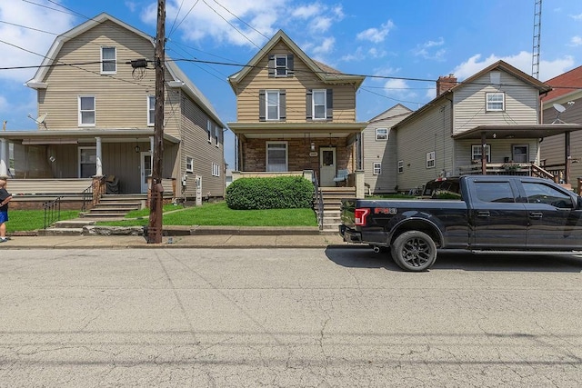 1621 4th St, New Brighton, PA 15066 - traditional home featuring a porch