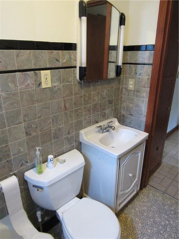 1764 Rose St, Lower Burrell, PA 15068 - bathroom with tile walls, vanity, and wainscoting
