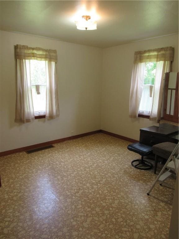 1764 Rose St, Lower Burrell, PA 15068 - empty room with healthy amount of natural light