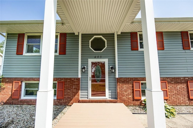 453 Falls Ave, Neshannock Twp, PA 16105 - view of exterior entry featuring brick siding and covered porch