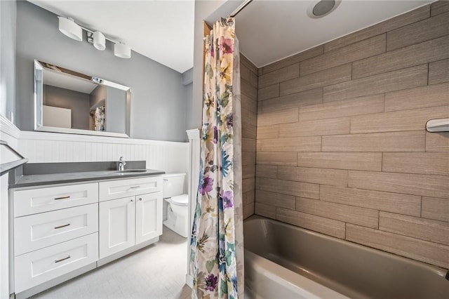 128 N Craig St Unit 703, Oakland, PA 15213 - bathroom with vanity, a wainscoted wall, and shower / bathtub combination with curtain