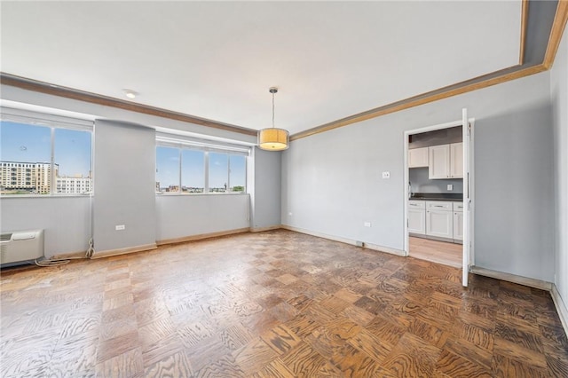 128 N Craig St Unit 703, Oakland, PA 15213 - unfurnished room with healthy amount of natural light and crown molding