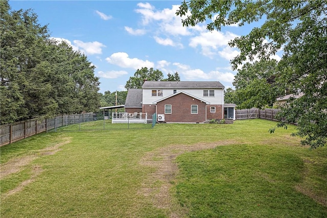 1922 Shady Oak Dr, Mccandless, PA 15101 - rear view of house with brick siding and a fenced backyard