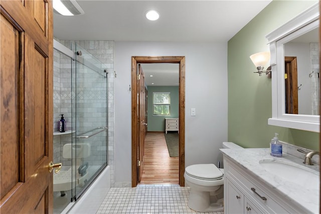 1922 Shady Oak Dr, Mccandless, PA 15101 - bathroom featuring vanity, tile patterned floors, bath / shower combo with glass door, and recessed lighting