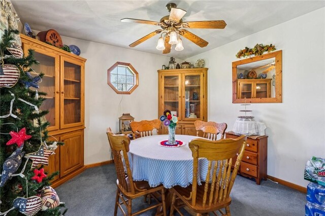 379 Airport Rd, Worthington, PA 16262 - carpeted dining space with baseboards and ceiling fan