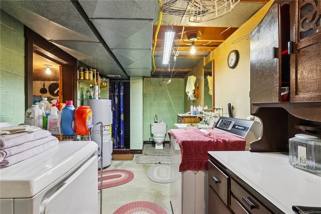 379 Airport Rd, Worthington, PA 16262 - laundry room featuring water heater and washer / dryer