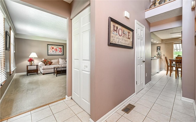 3150 Sundance Ct, Hampton, PA 15101 - hallway with light tile patterned floors and light carpet