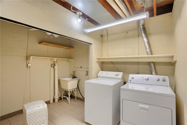 113 S Heide Ln, Peters Twp, PA 15317 - laundry area with independent washer and dryer and light tile patterned floors