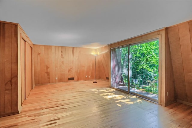 113 S Heide Ln, Peters Twp, PA 15317 - unfurnished room featuring light wood-type flooring and wood walls